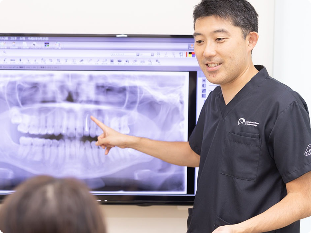 補綴学会指導医による治療の様子